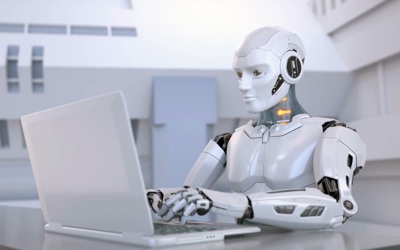 ノートパソコンのキーボードを打つロボット